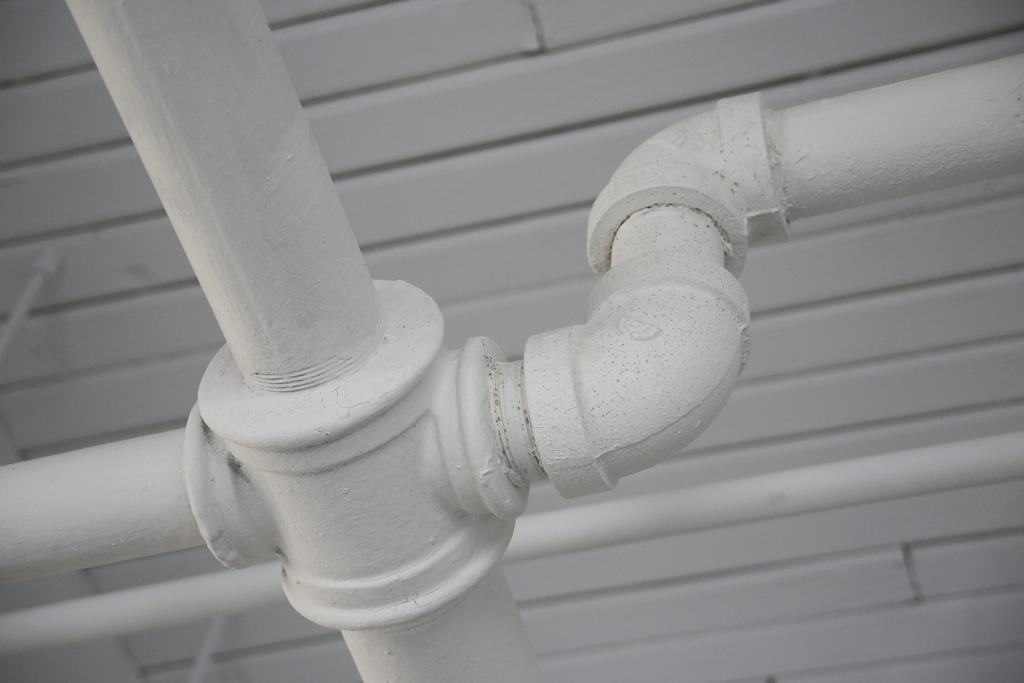 Plumbing pipes painted white